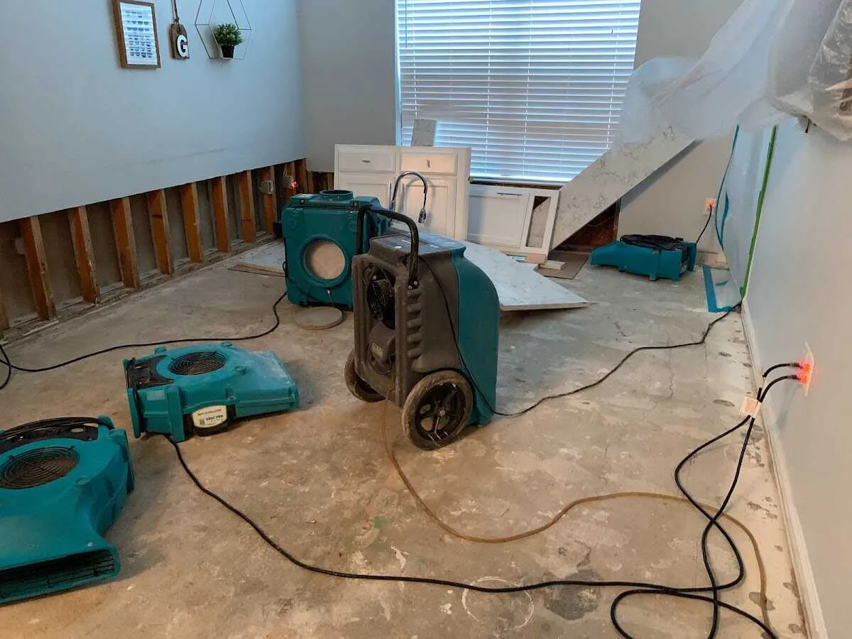 Dehumidifier in flood-cut room for Water Damage Restoration in Chardon